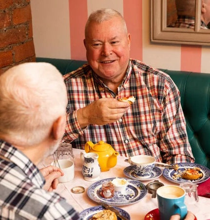 Two men having coffee